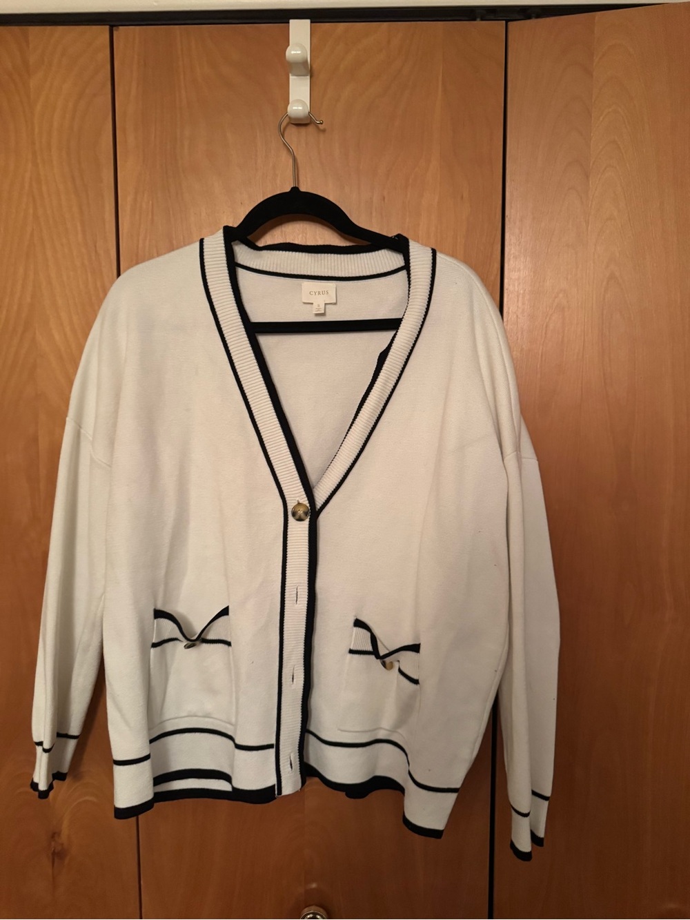 Cyrus Cream Knit Cardigan with Black Trim and Bow Pockets